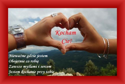 D�onie uk�adaj�ce kszta�t serca na tle g�r, czerwony napis Kocham Ci� oraz mi�osny wiersz