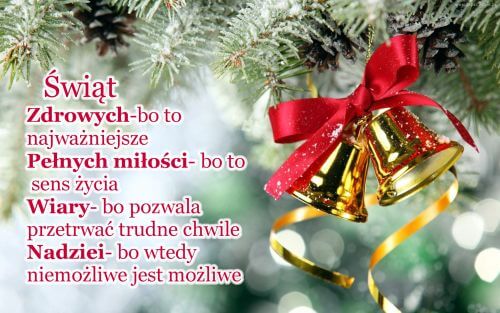 Z�ote dzwonki z czerwon� kokard� na ga��zkach choinki z �yczeniami �wi�tecznymi i szyszki