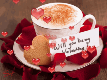Fili�anka kawy z piank�, ciasteczko w kszta�cie serca, p�atki r� i czerwone serduszka z napisem Will you be my Valentine