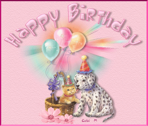 Pies i kot w czapkach urodzinowych, koszyk, kolorowe balony oraz napis Happy Birthday na różowym tle