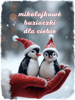 Dwa ma�e pingwiny w czapkach miko�ajowych stoj� obok napisu i czerwonej czapki