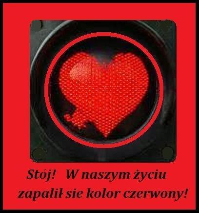 Czerwone �wiat�o sygnalizatora w kszta�cie serca oraz napis St�j W naszym �yciu zapali� si� kolor czerwony