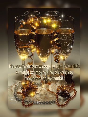 B�yszcz�ce kieliszki z szampanem, z�ote serpentyny, koraliki i napis z �yczeniami noworocznymi