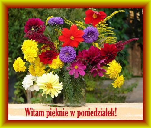 Kolorowy bukiet kwiatów w szklanym wazonie oraz napis Witam pięknie w poniedziałek